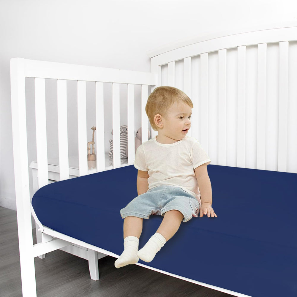 Magik & Kover two-pack fitted sheets in neutral navy.