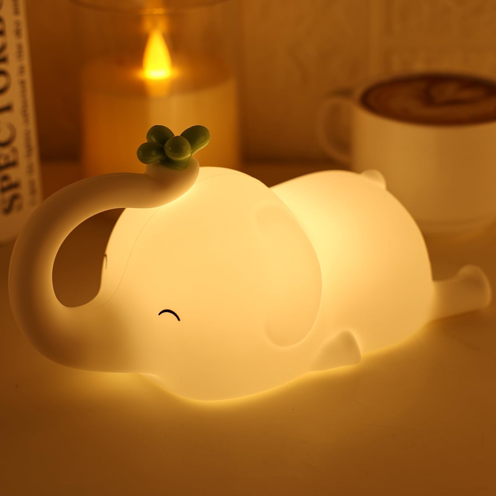 MAGOHMT silicone elephant night light viewed from the top with soft bedtime glow