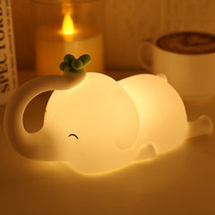 MAGOHMT silicone elephant night light viewed from the top with soft bedtime glow