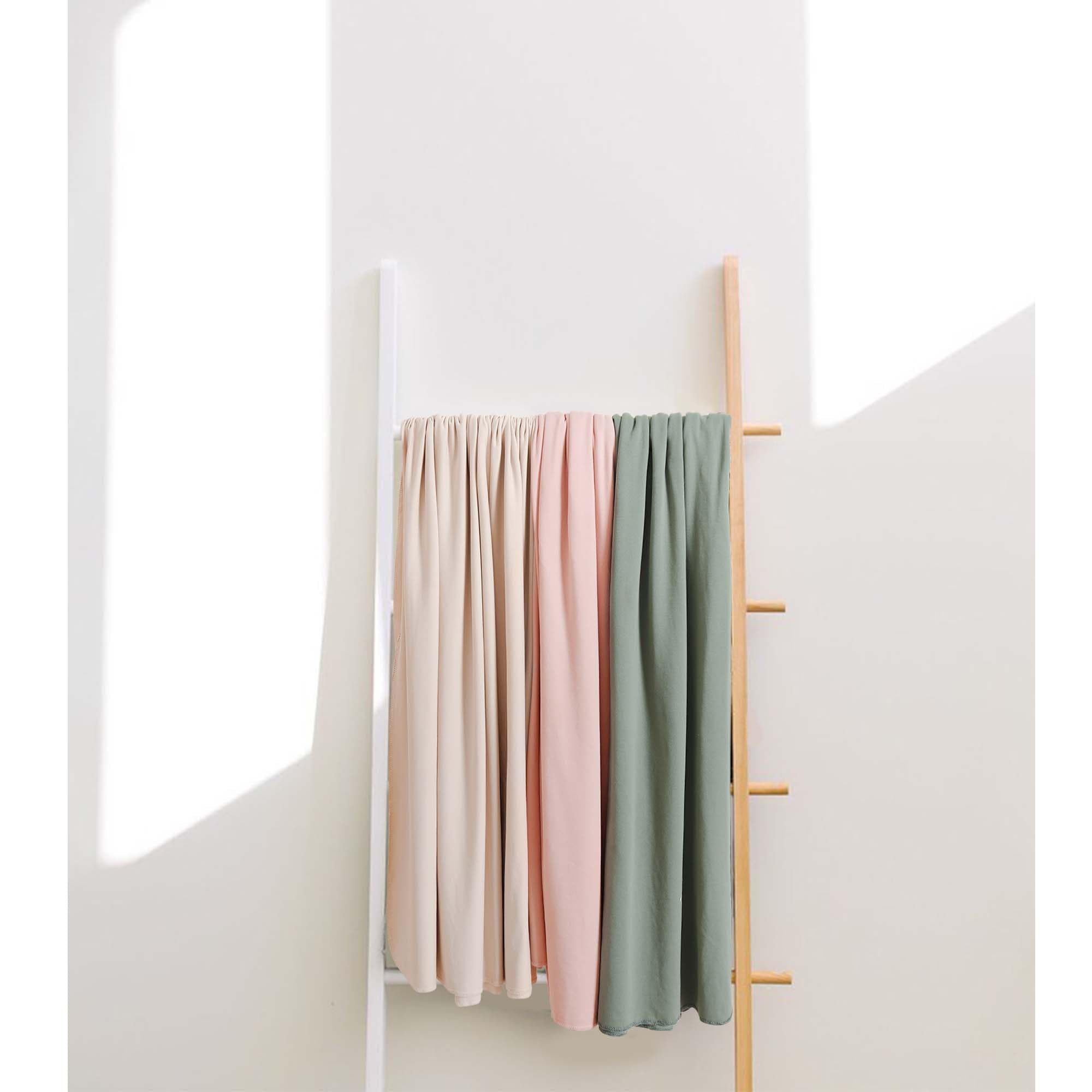 Gift-ready MairMore swaddle set in green for baby showers