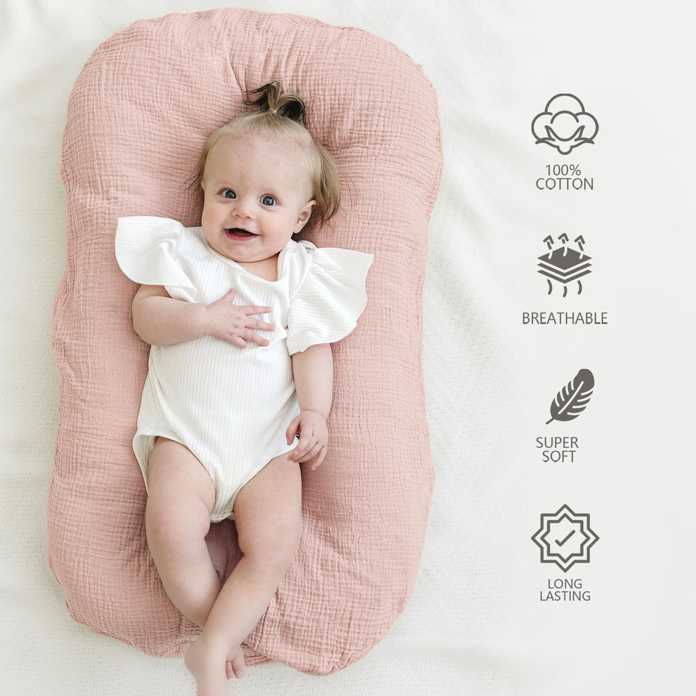 MairMore muslin baby lounger cover pink blossom on lounger, breathable fabric for comfy naps.