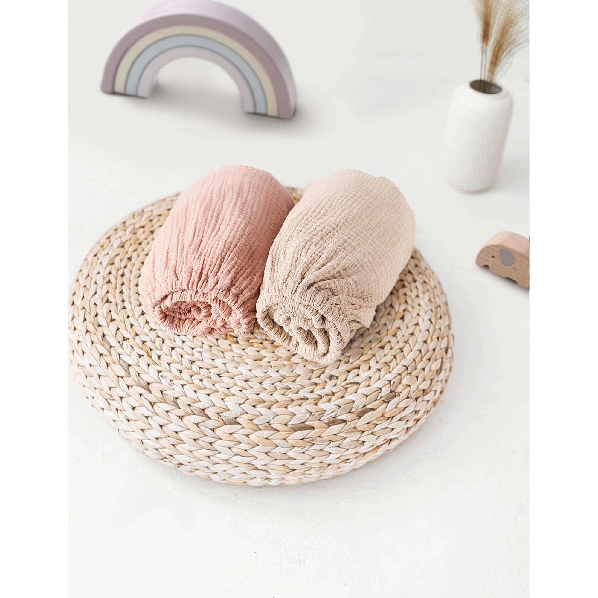 MairMore muslin bassinet sheet pink shade adds gentle nursery charm