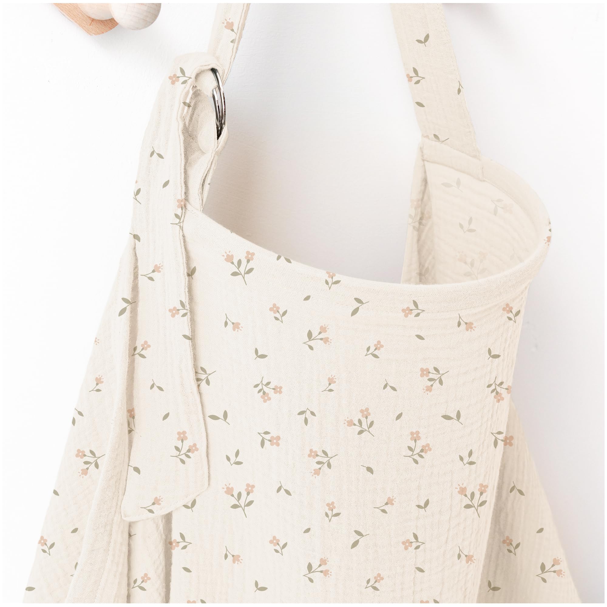 MairMore arch-neckline muslin nursing cover offers breathable privacy during feeding.