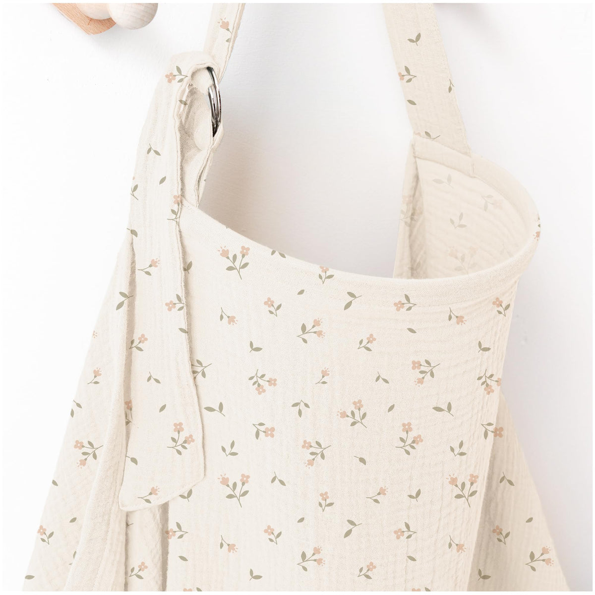 MairMore arch-neckline muslin nursing cover offers breathable privacy during feeding.