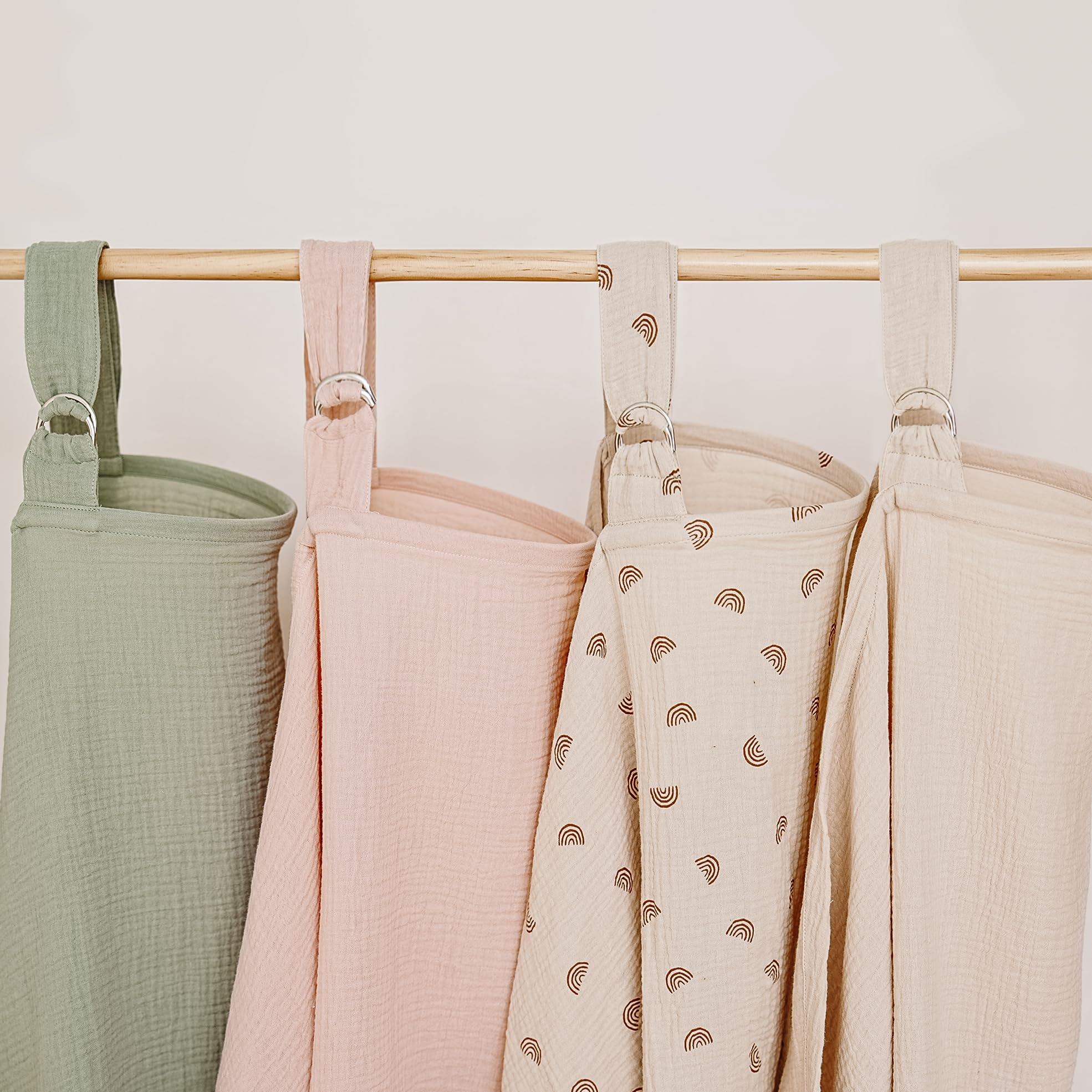Color options for MairMore muslin nursing cover: apricot, green, pink, rainbow