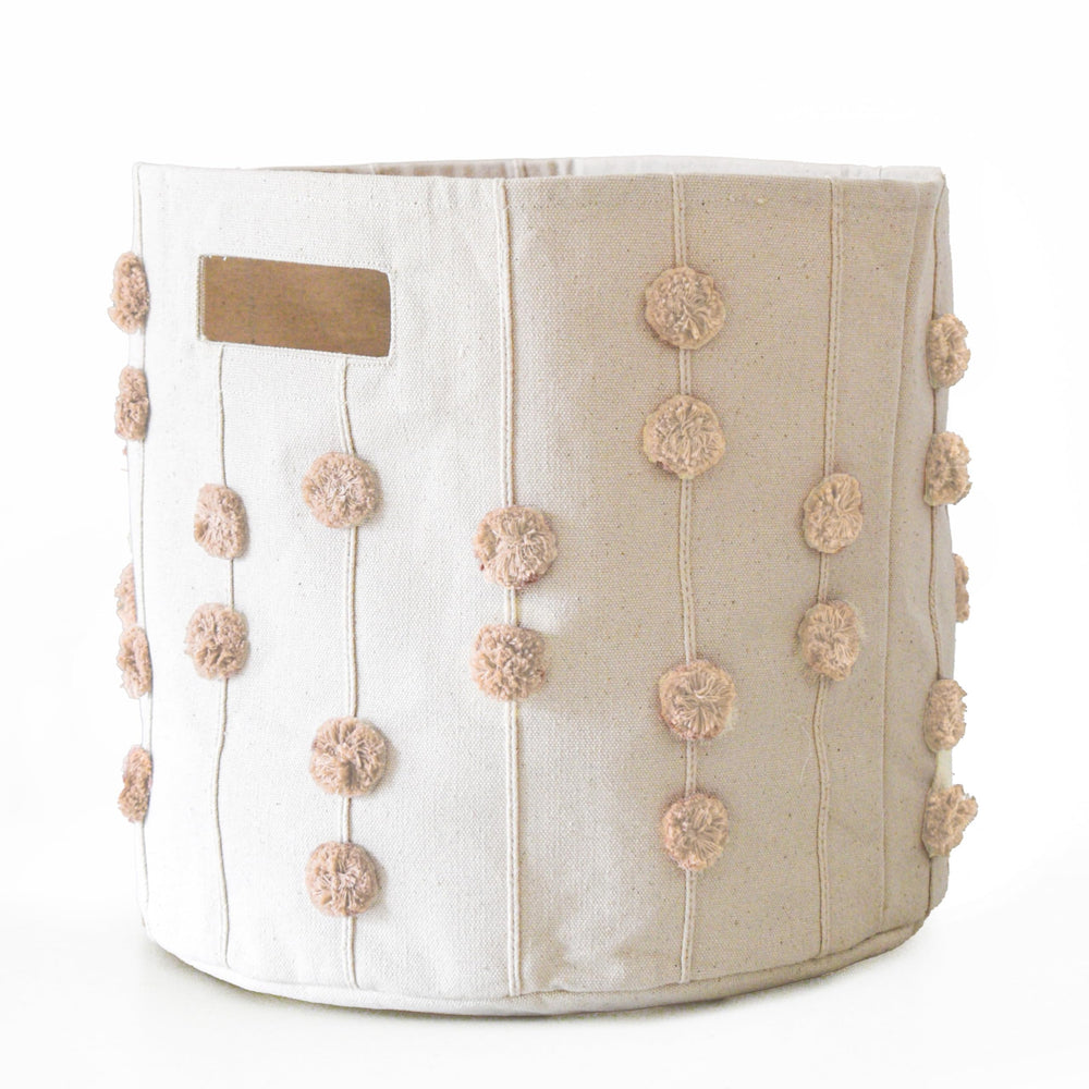 Makemake Organics canvas bin used as decorative storage in a kid's room.