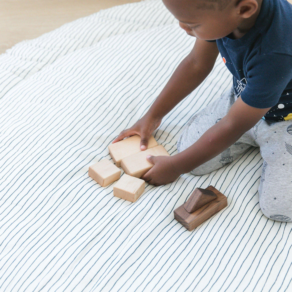 MakeMake Organics machine-washable play mat for easy cleaning and maintenance.