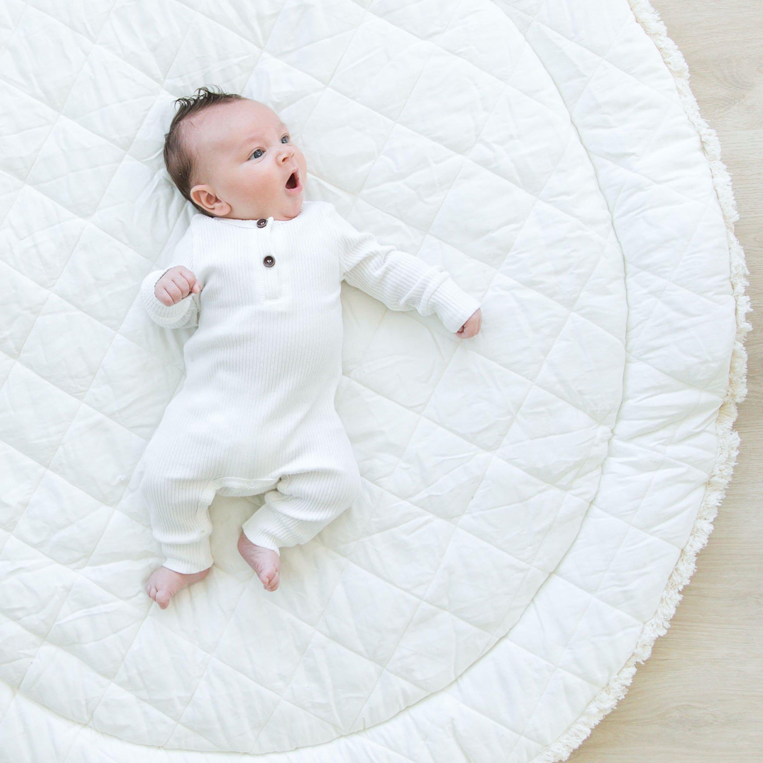 MakeMake Organics nursery floor rug with soft surface for safe baby play.