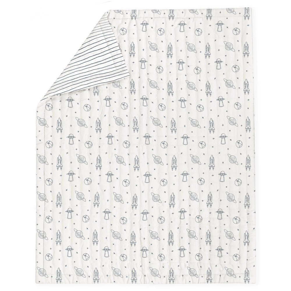 MakeMake Organics reversible design comforter offers two playful looks for easy room styling