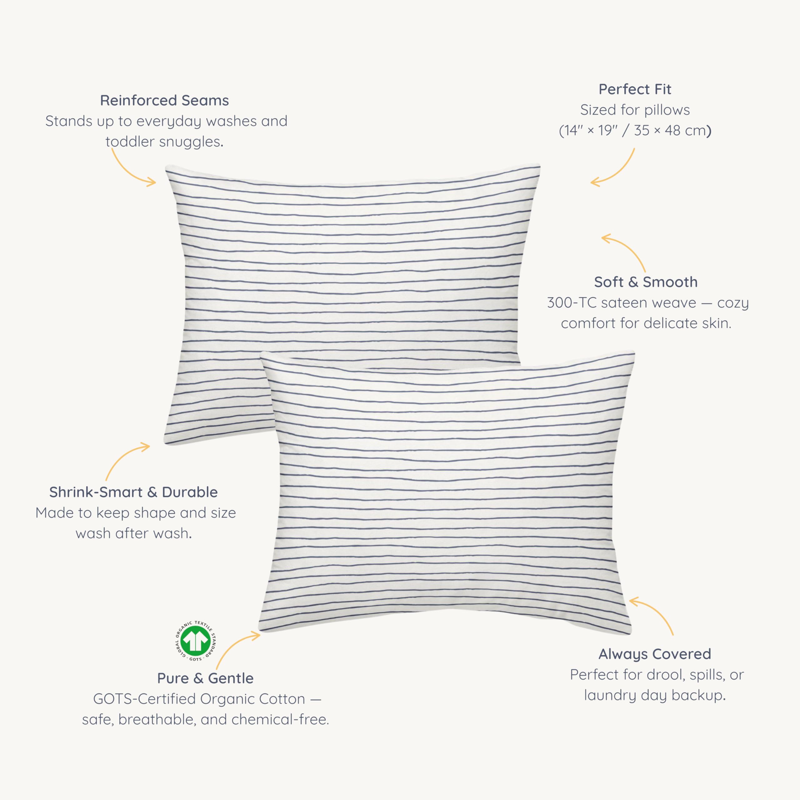 Makemake Organics toddler pillowcase navy stripes shown in reusable gift bag packaging.