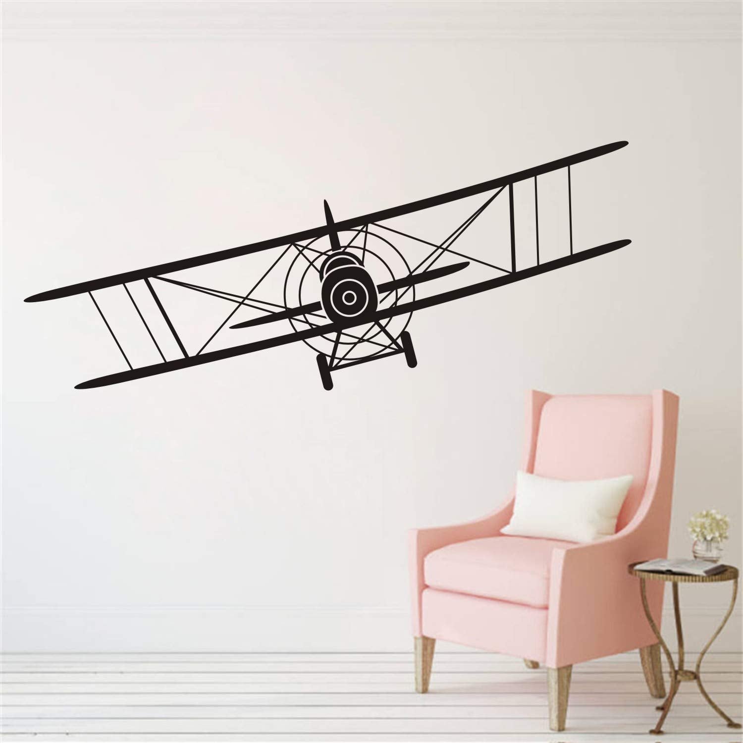 Makeyes Biplane wall decal in black creates a bold focal point on walls.
