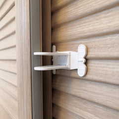 Makibi sliding door lock close-up illustrates secure adhesion for child safety