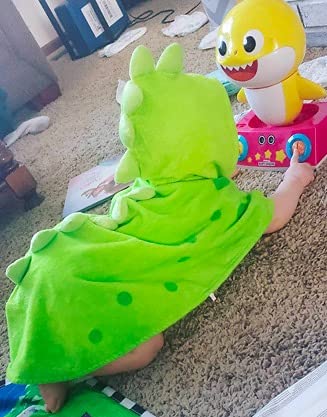 Maleroads green dinosaur towel great for beach, pool, or water play outings.