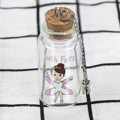 Malihome keepsake jar with cork stores a baby tooth securely