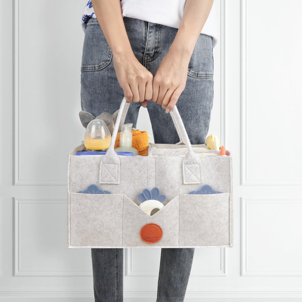 Maliton diaper caddy showing eight exterior pockets for quick access
