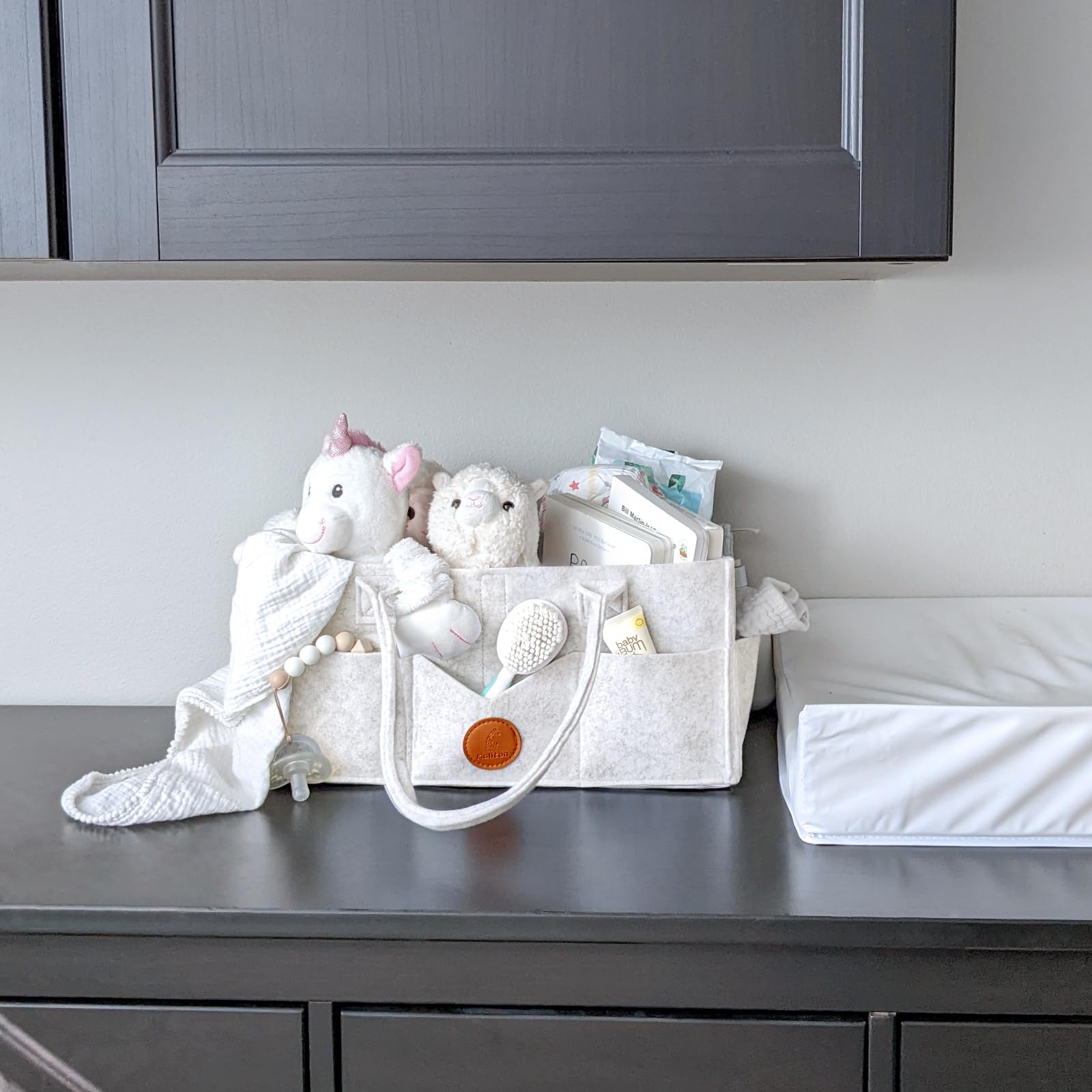 Maliton caddy holding pacifiers and small items within reach