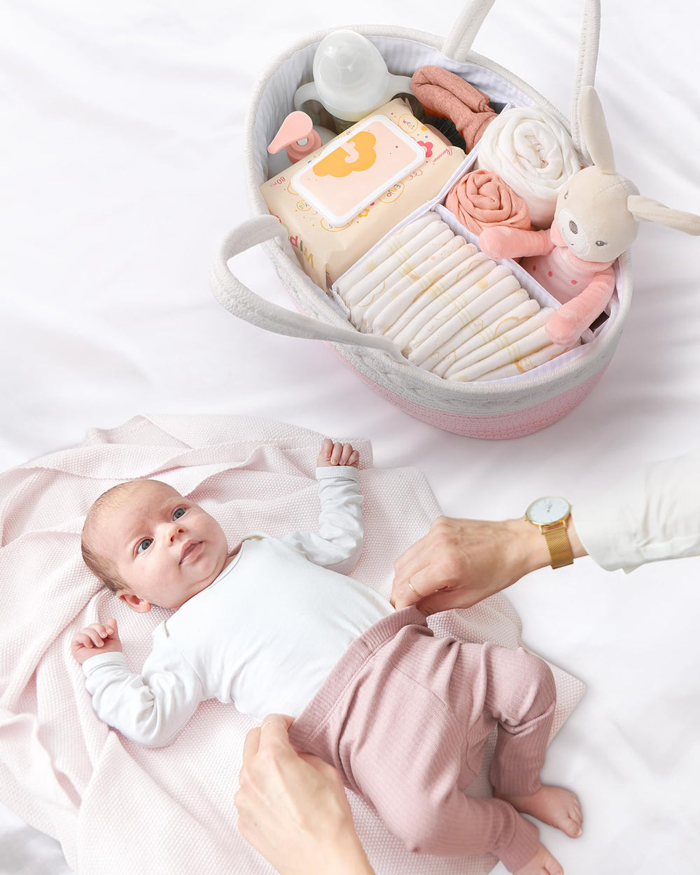 Maliton diaper caddy changing table setup keeps essentials at hand.