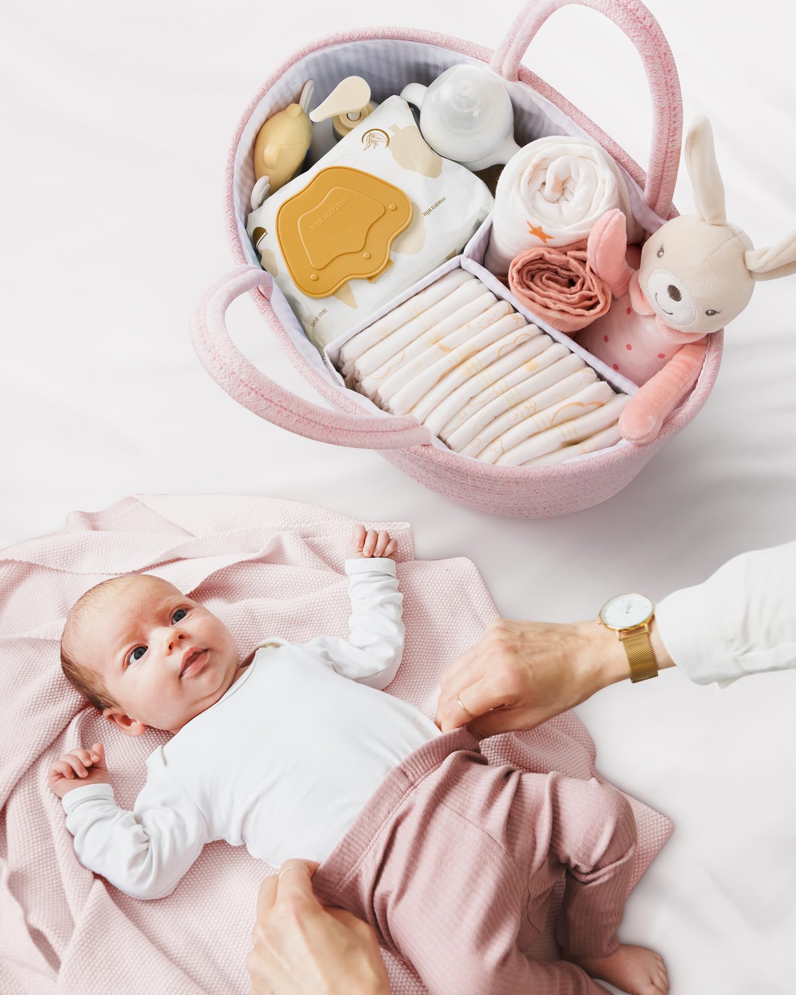 Maliton diaper caddy easily moves with longer handles between nursery, bathroom, and car