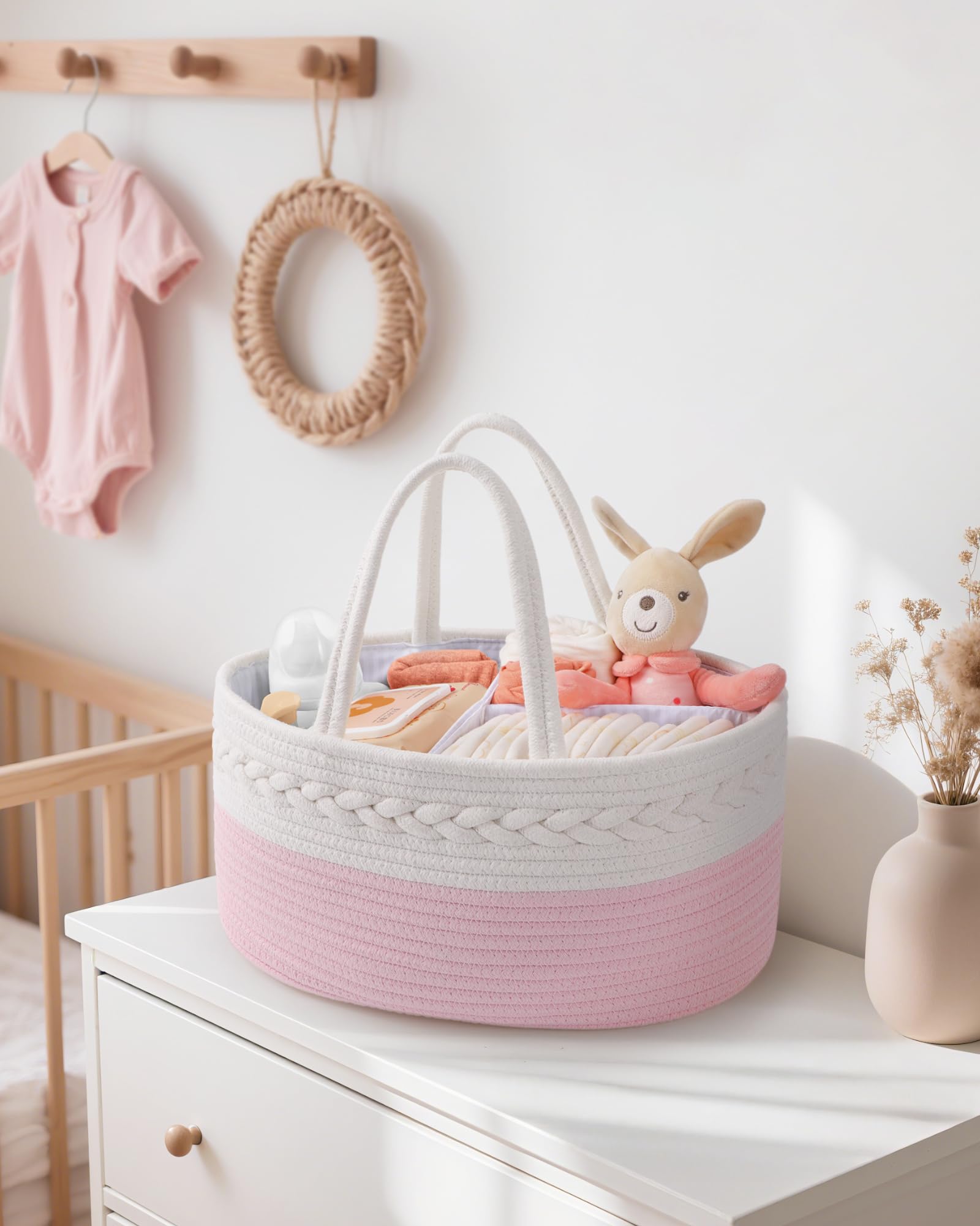 Maliton diaper caddy long handles make it easy to move between rooms.