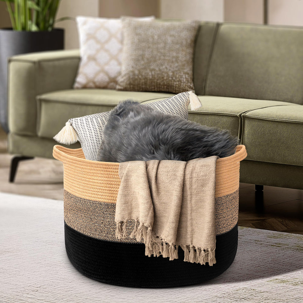 Maliton laundry basket in round shape proving easy carry and transport.