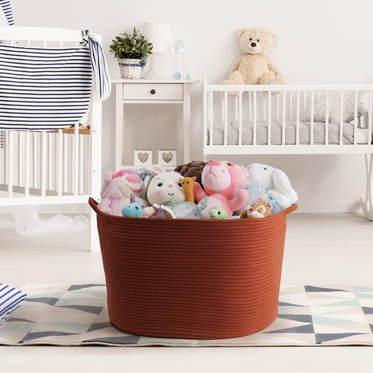 Maliton basket stores towels, ideal for bathrooms and linen closets.
