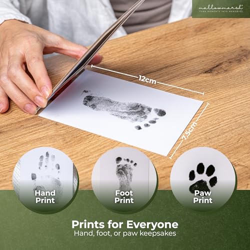 Mallowmarsh baby hand on imprint card during print.