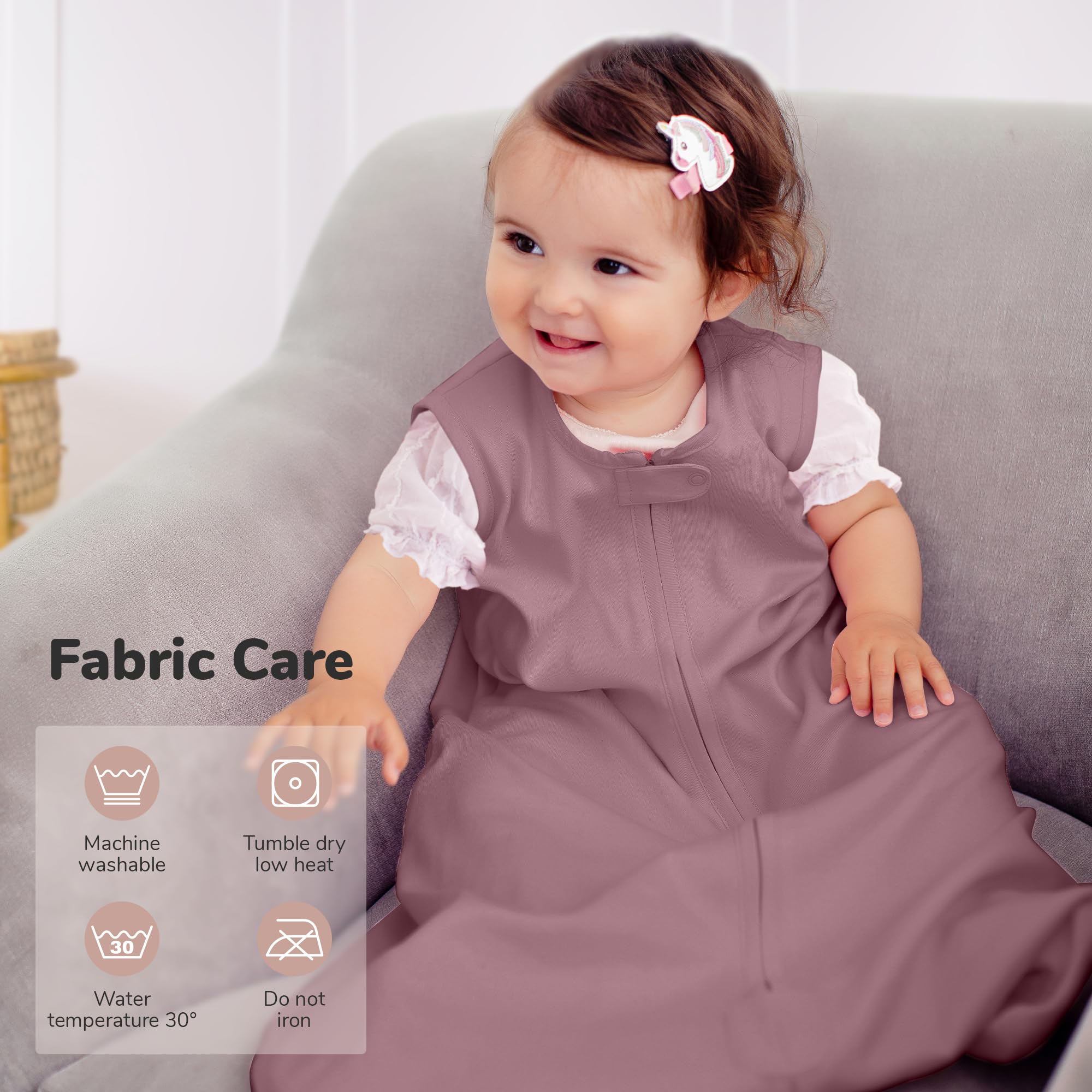 Safety neck tab detail on Mama Cheetah sleep sack for secure sleep.