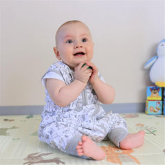 Mama Cheetah sleep sack with feet worn by toddler showcasing 1.0 TOG warmth
