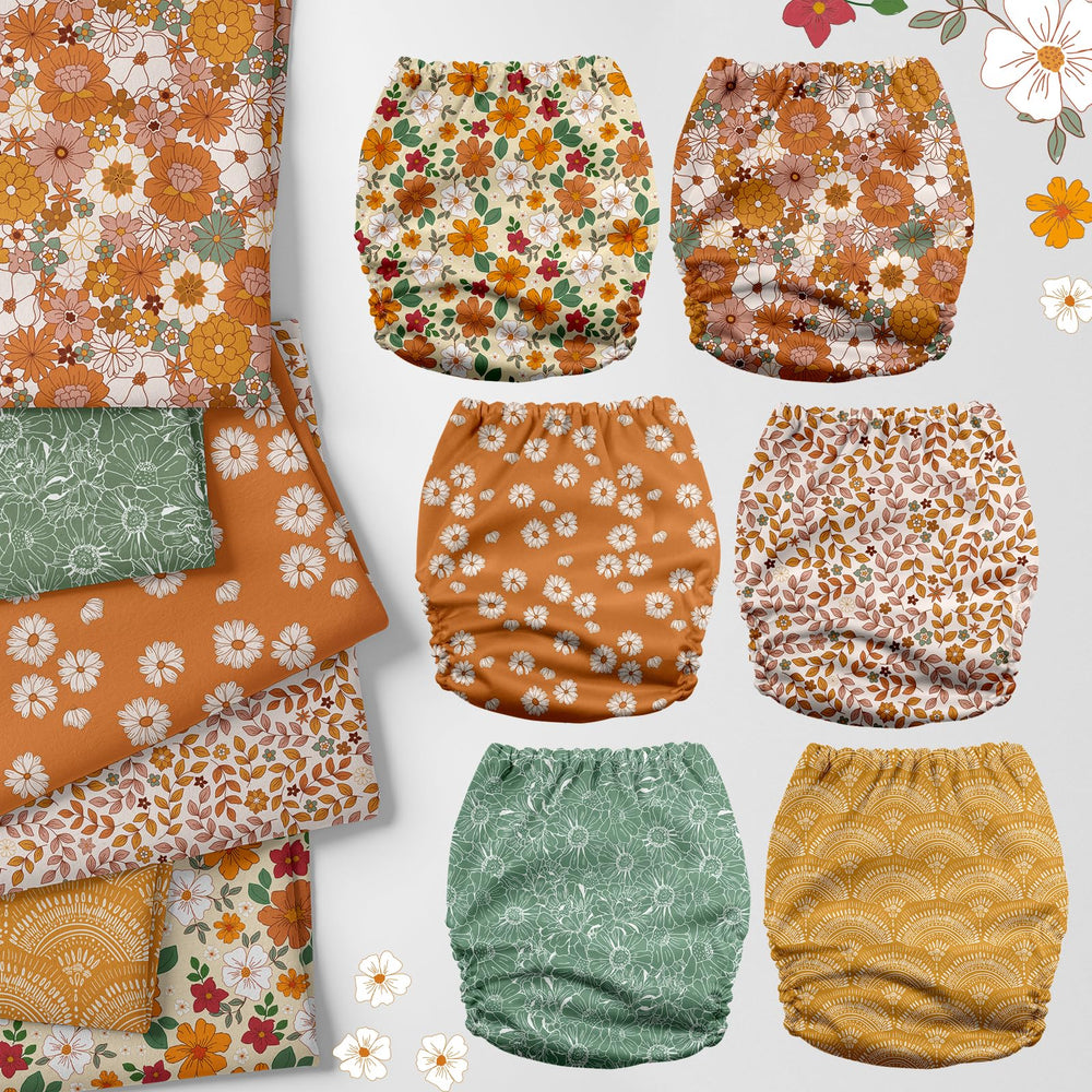 Mama Koala 3.0 pocket diaper with hip snaps prevents wing droop during movement