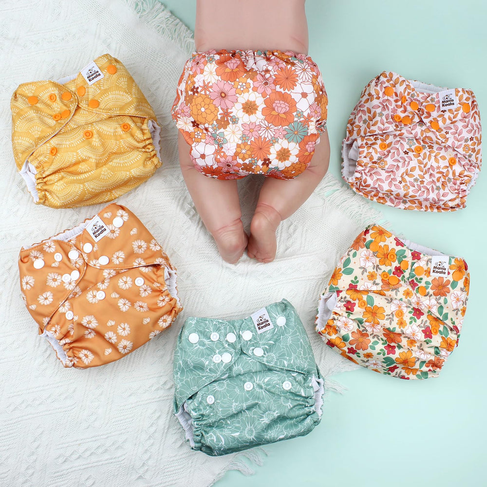 Mama Koala 3.0 pocket diaper uses a waterproof TPU cover to keep baby dry