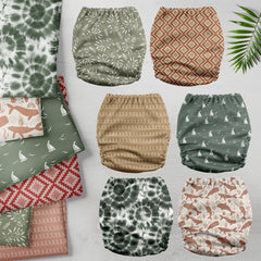 Mama Koala 3.0 pocket diaper crossover snaps secure fit without wing droop.