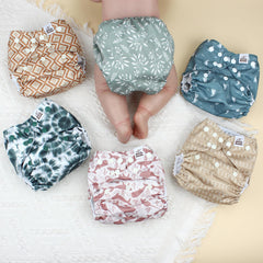 Mama Koala 3.0 pocket diaper hip snaps for snug, adjustable positioning.