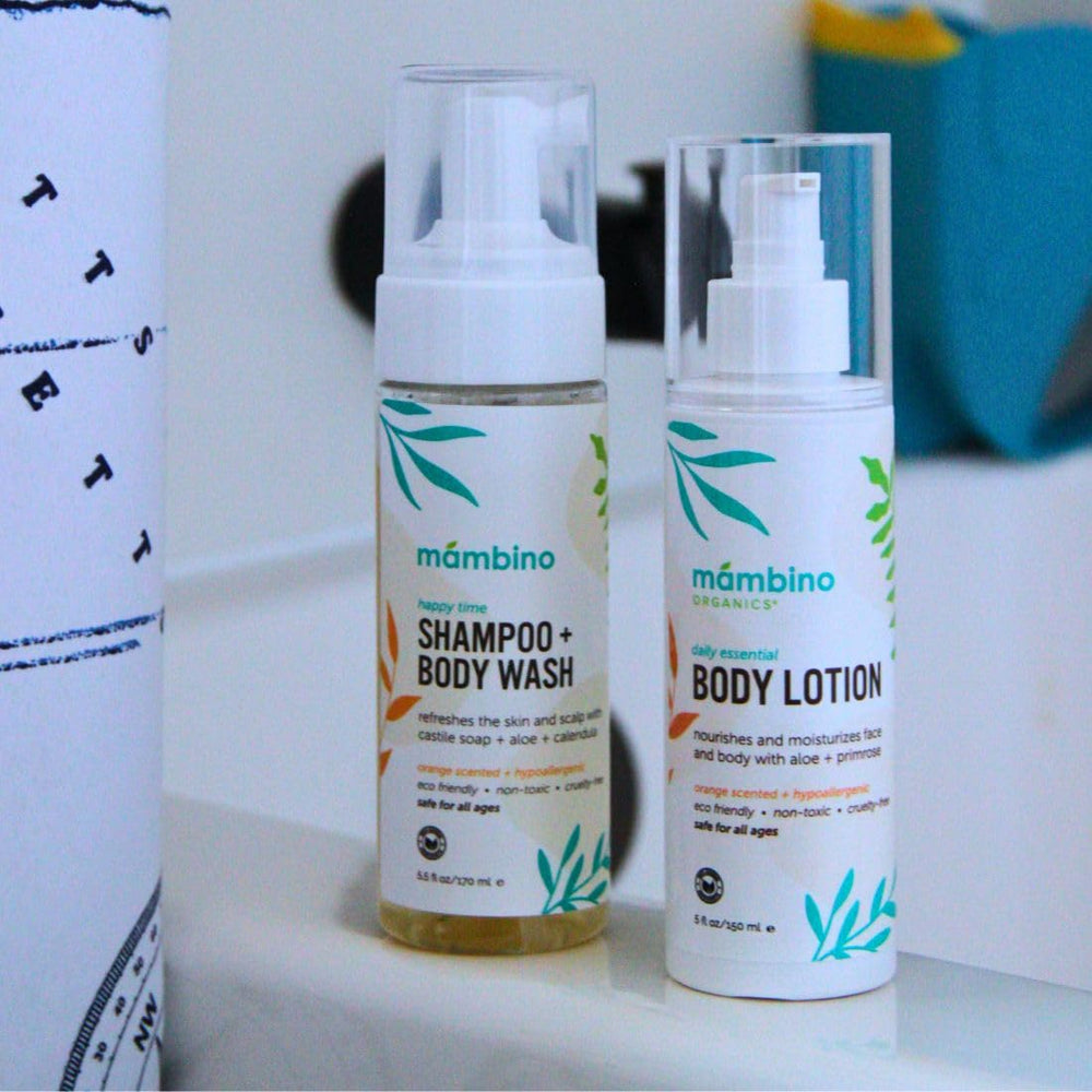 Mambino Organics Happy Time body wash bottle with calendula-orange scent for gentle cleansing.