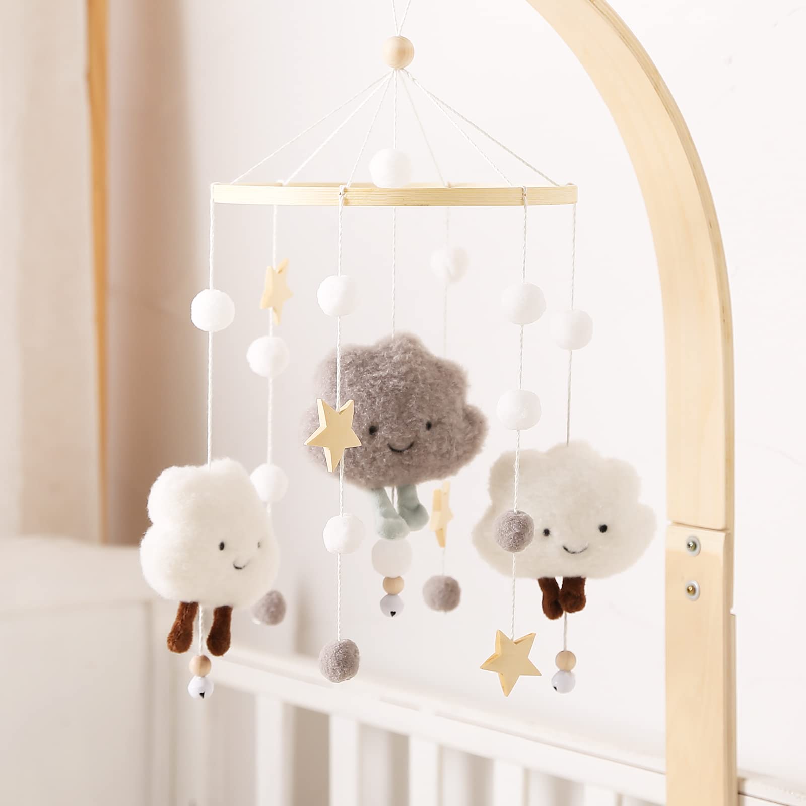 Mamimami Home grey clouds mobile features soft colors to engage newborn focus.