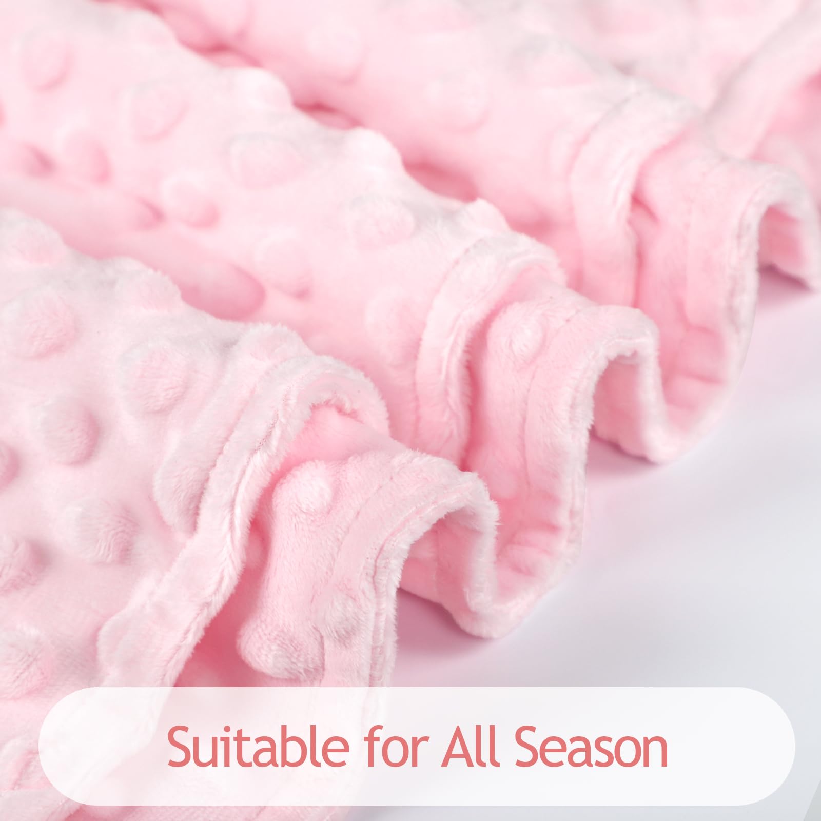 Man Fai Sky pink car seat blanket providing warmth during travel.