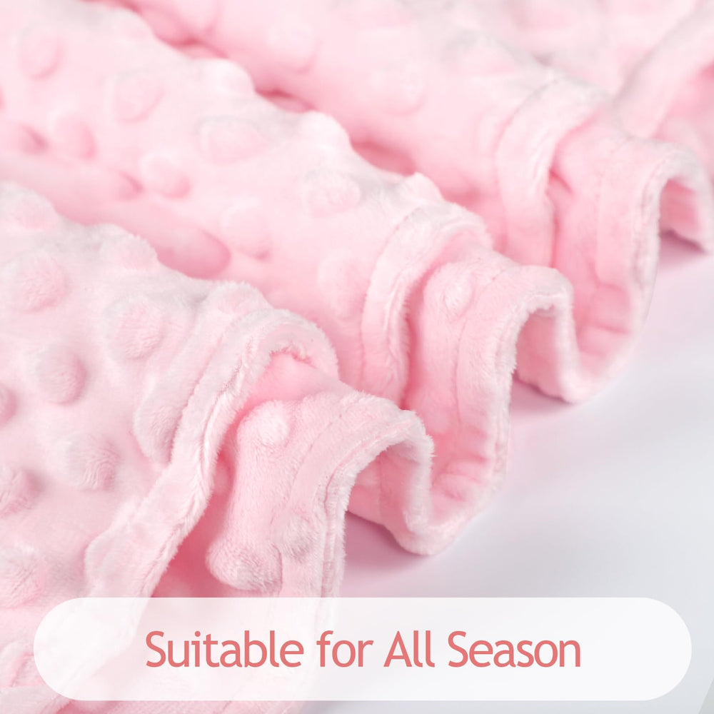 Man Fai Sky pink car seat blanket providing warmth during travel.