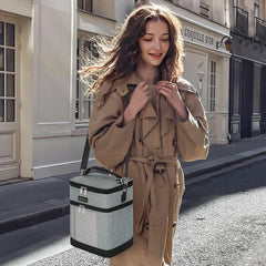 Mancro cooler bag includes reusable ice pack to extend freshness during travel.