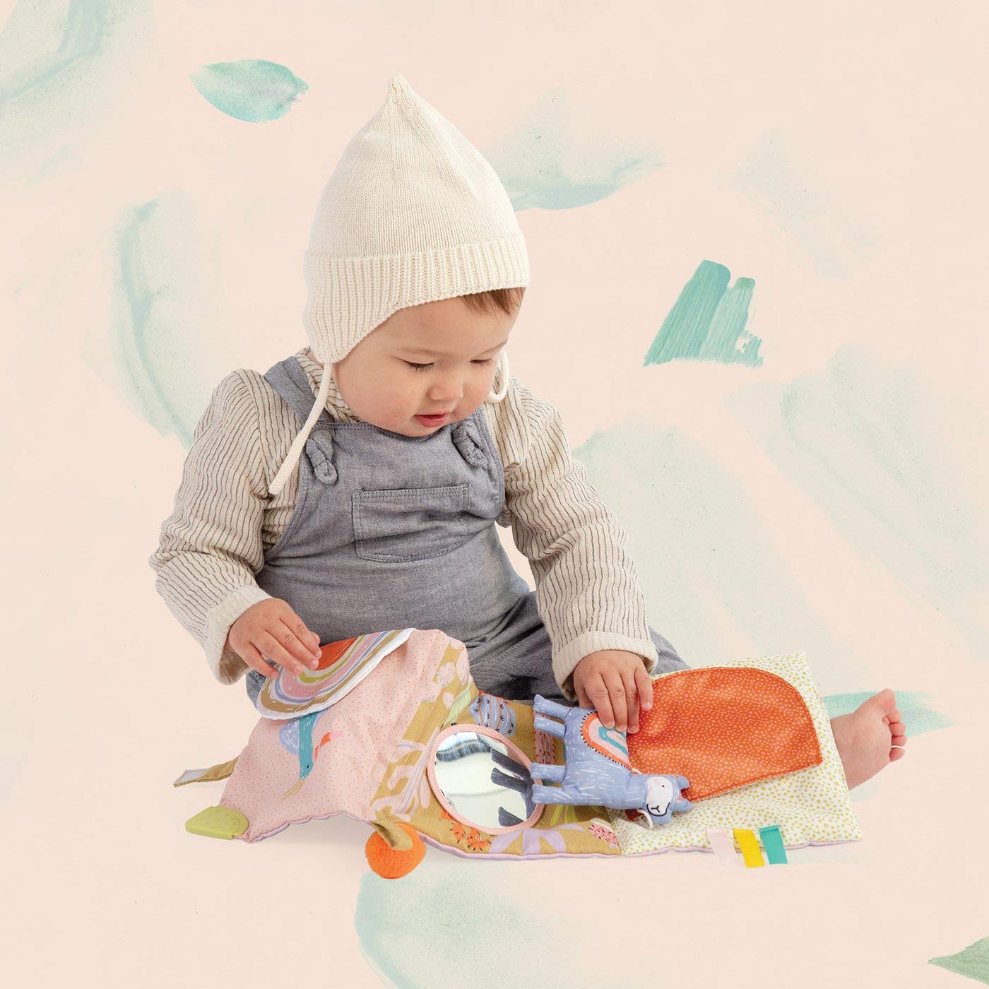 Manhattan Toy Llama Soft Baby Activity Book surface-cleanable fabrics simplify cleanup after cuddles.
