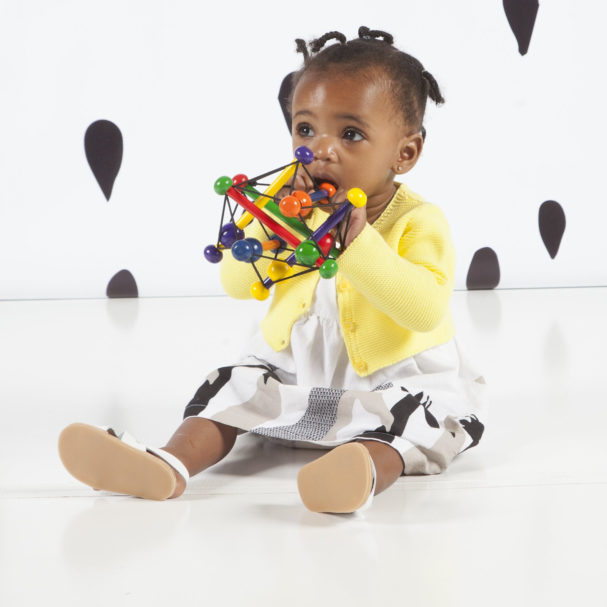 Manhattan Toy Skwish Classic safe, sustainable rubberwood with non-toxic finish.