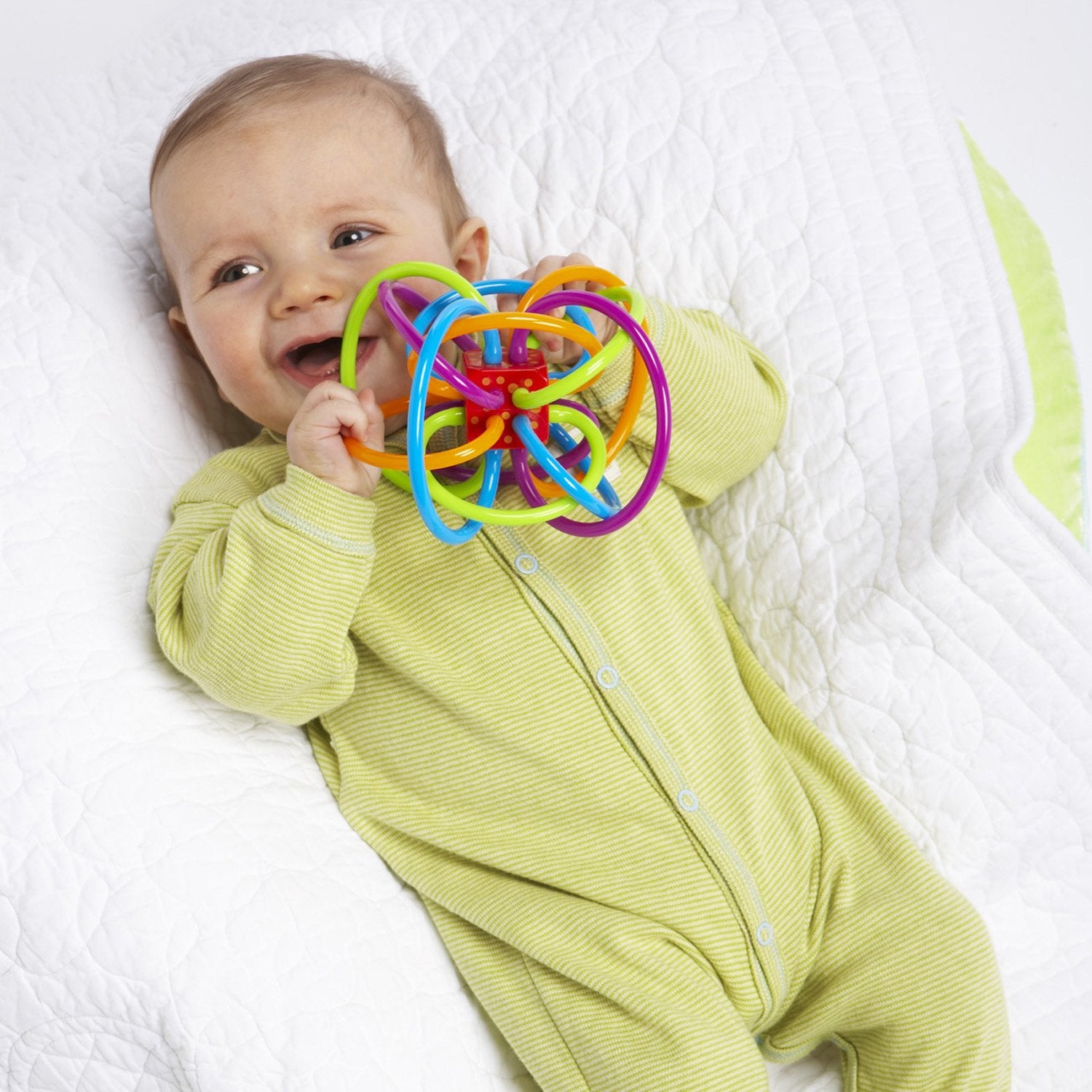 Winkel teether tubes close-up showing soft, BPA-free material for mouthing.