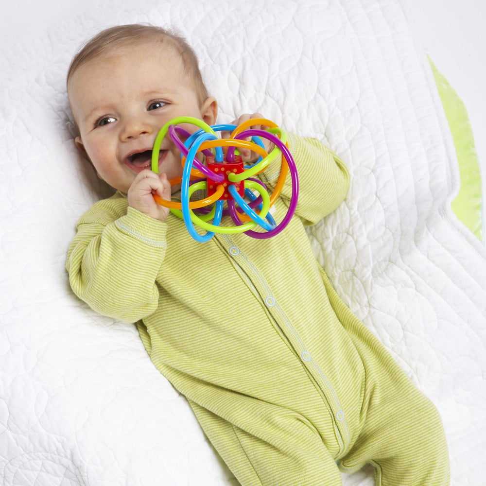 Winkel teether tubes close-up showing soft, BPA-free material for mouthing.