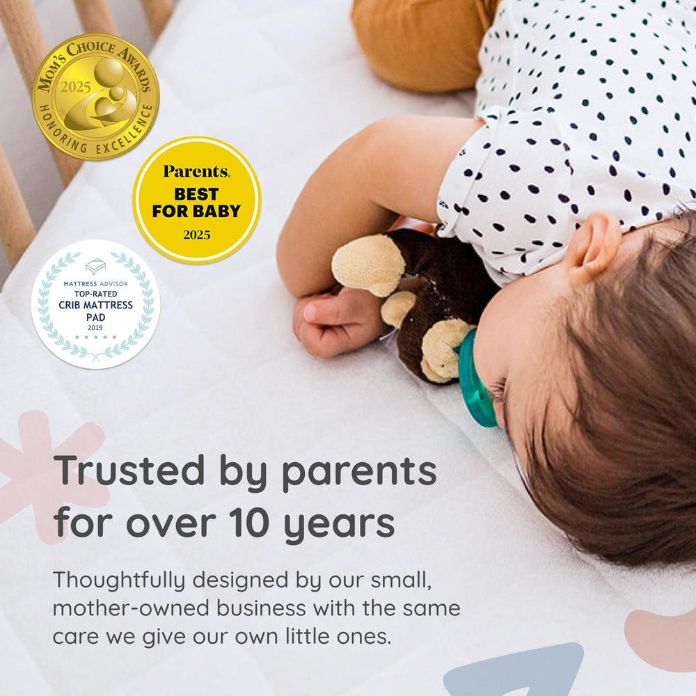 Margaux & May protector with waterproof layer guarding the crib mattress against spills