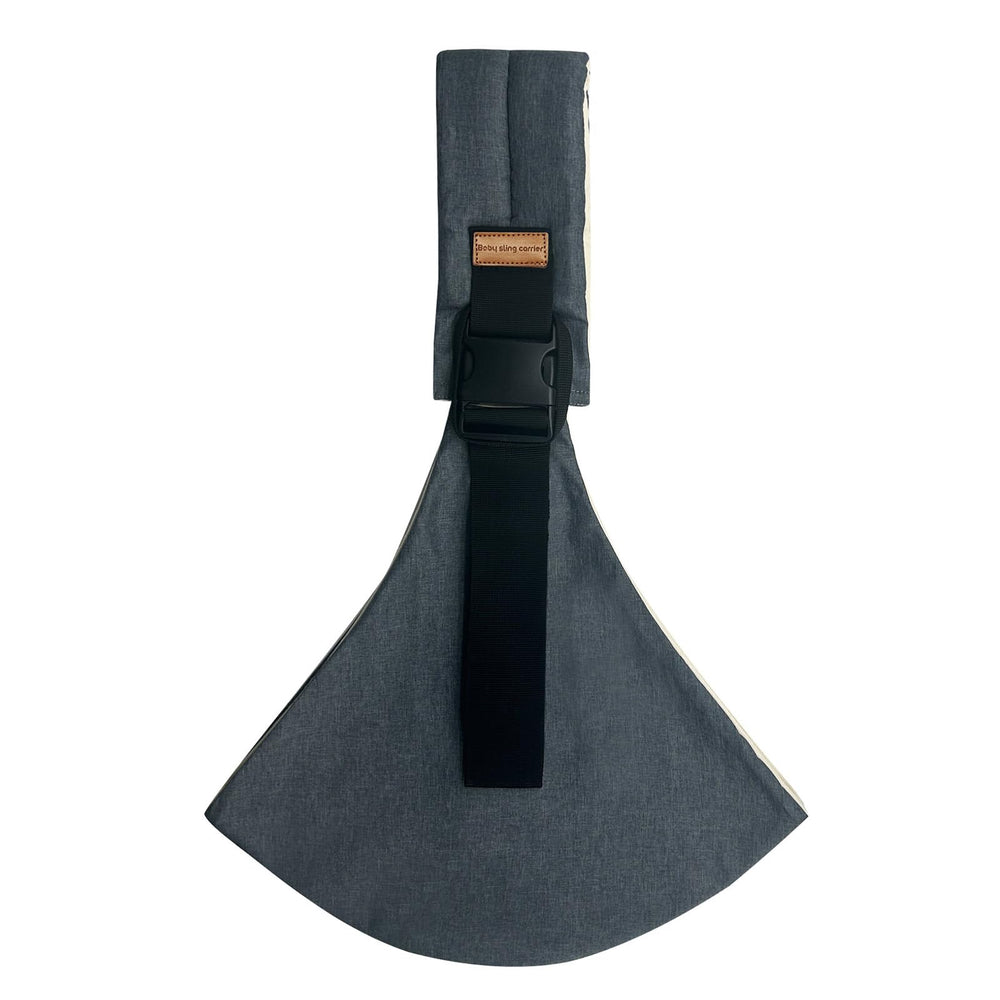 Marrlly baby sling in gray worn by parent for hands-free bonding