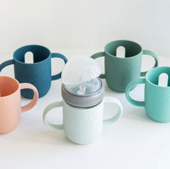 Mason Bottle silicone sleeve protects glass from drops during meals.