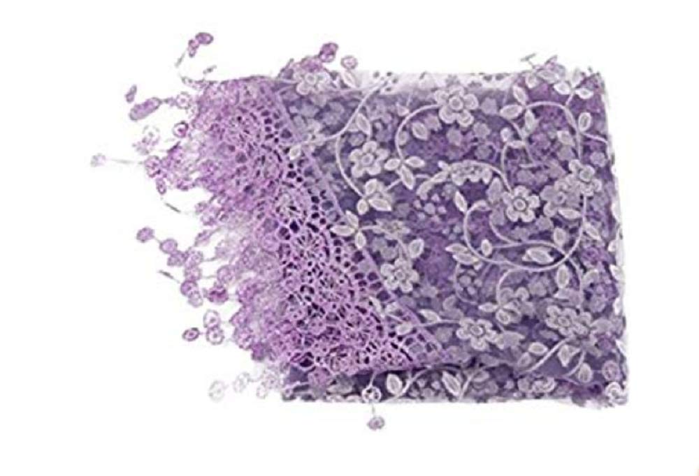 Matissa newborn lace tassels wrap in purple used as a chic photography prop and cozy swaddle