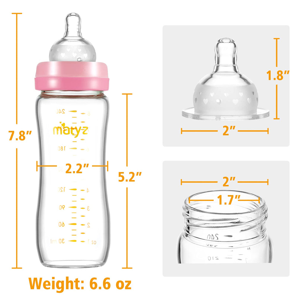 Matyz baby feeding bottle in hand, ergonomic grip during feeding.