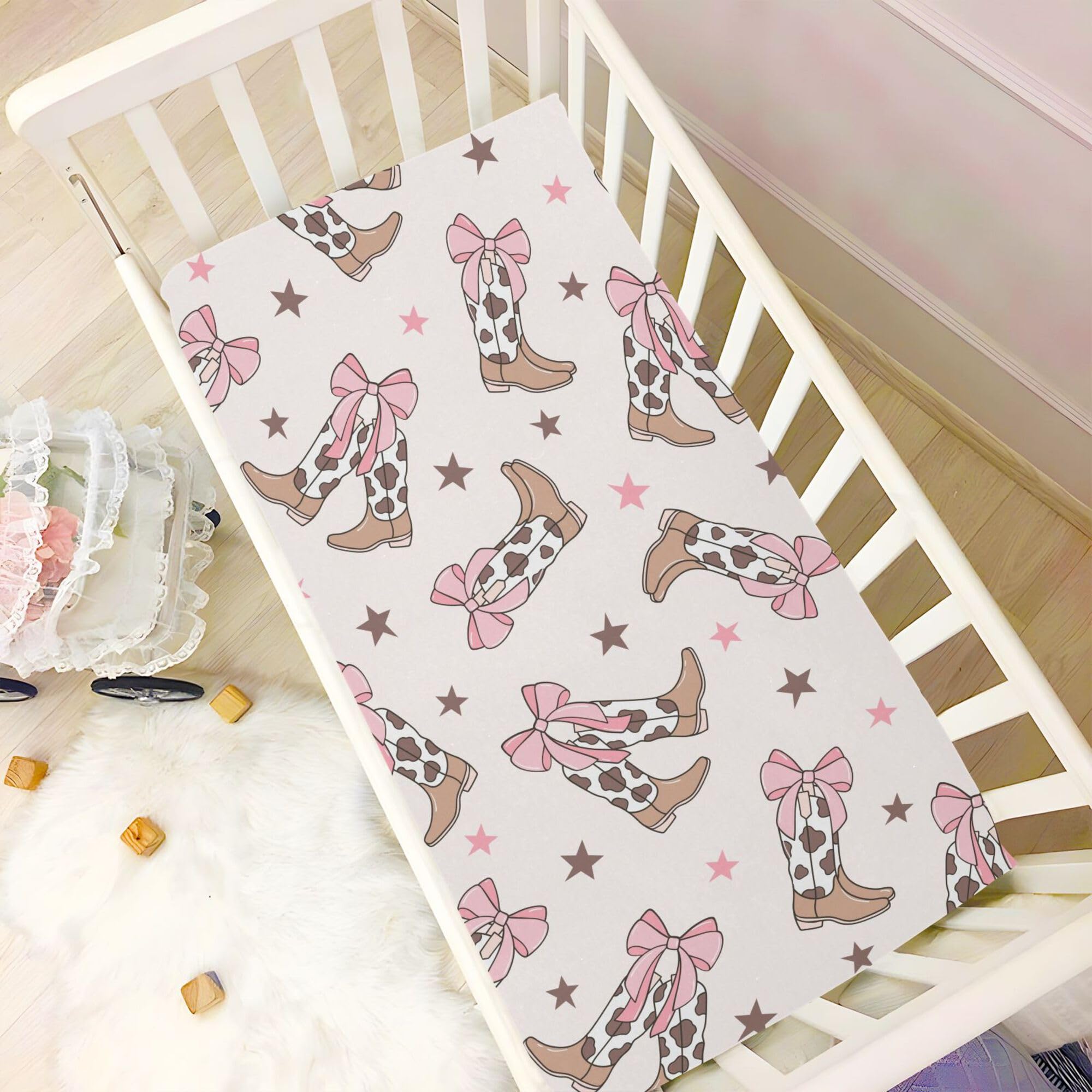 Mazeann Bows crib sheet is machine washable for easy care between naps.