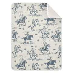 Mazeann Cowboys Blanket folded for travel, offering soft warmth on the go.