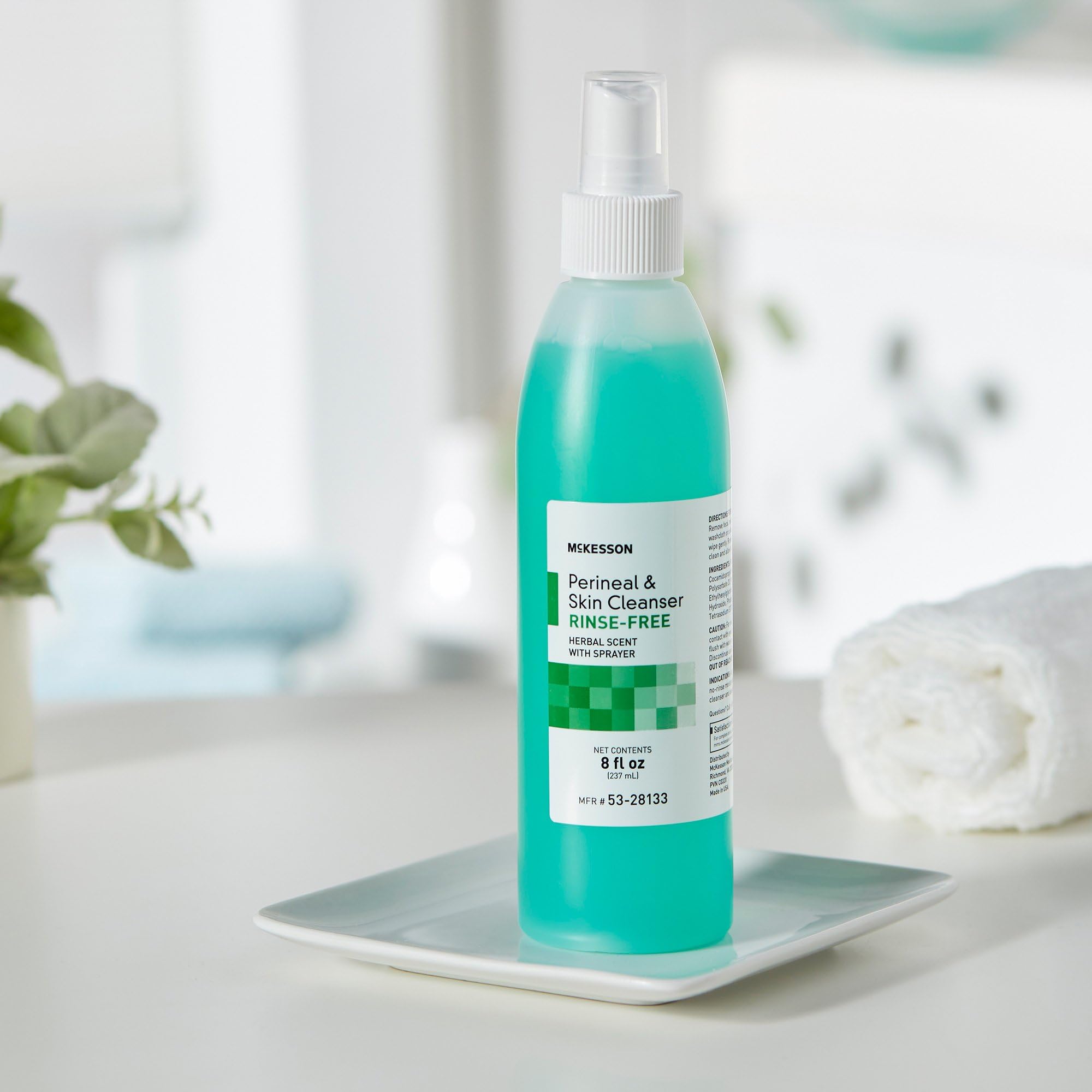 Person applying rinse-free cleanser with pump for peri-care.