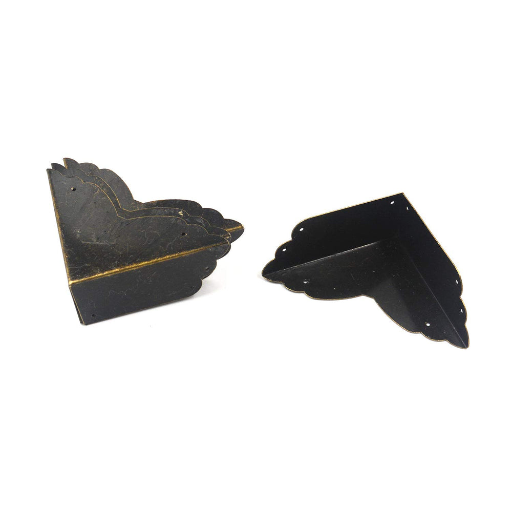 Mcredy bronze box corner protectors set on a jewelry box for edge protection.